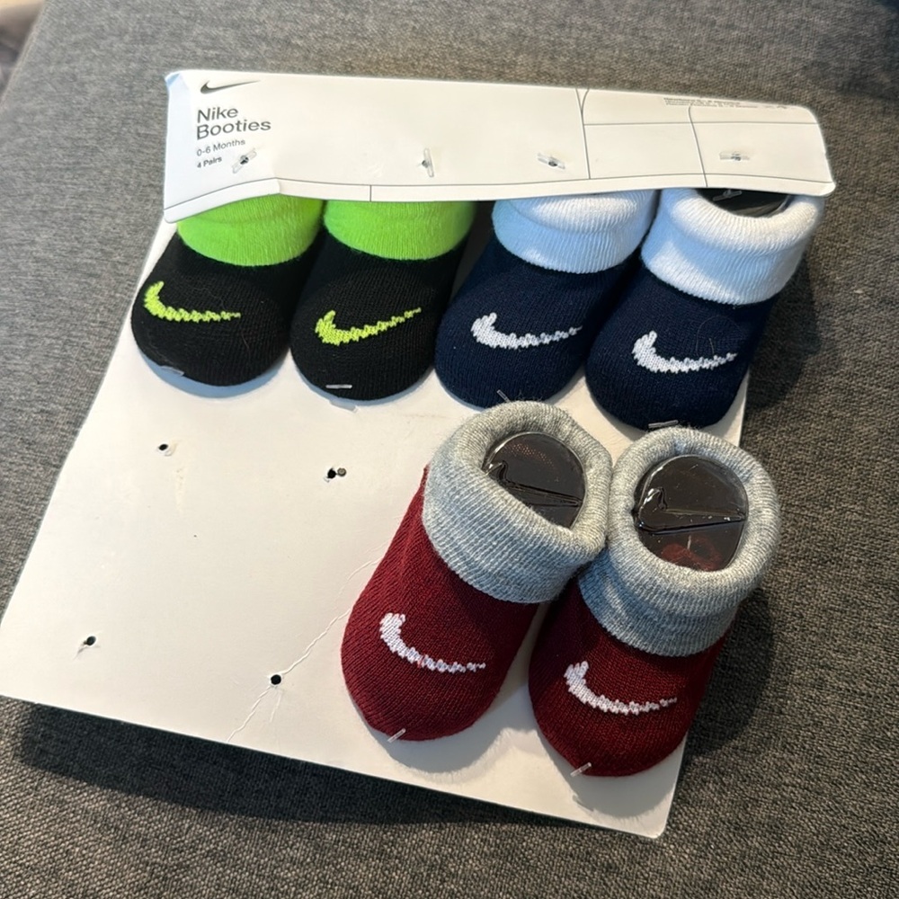 Nike Booties 0-6 months 3 pair newborn socks- booties